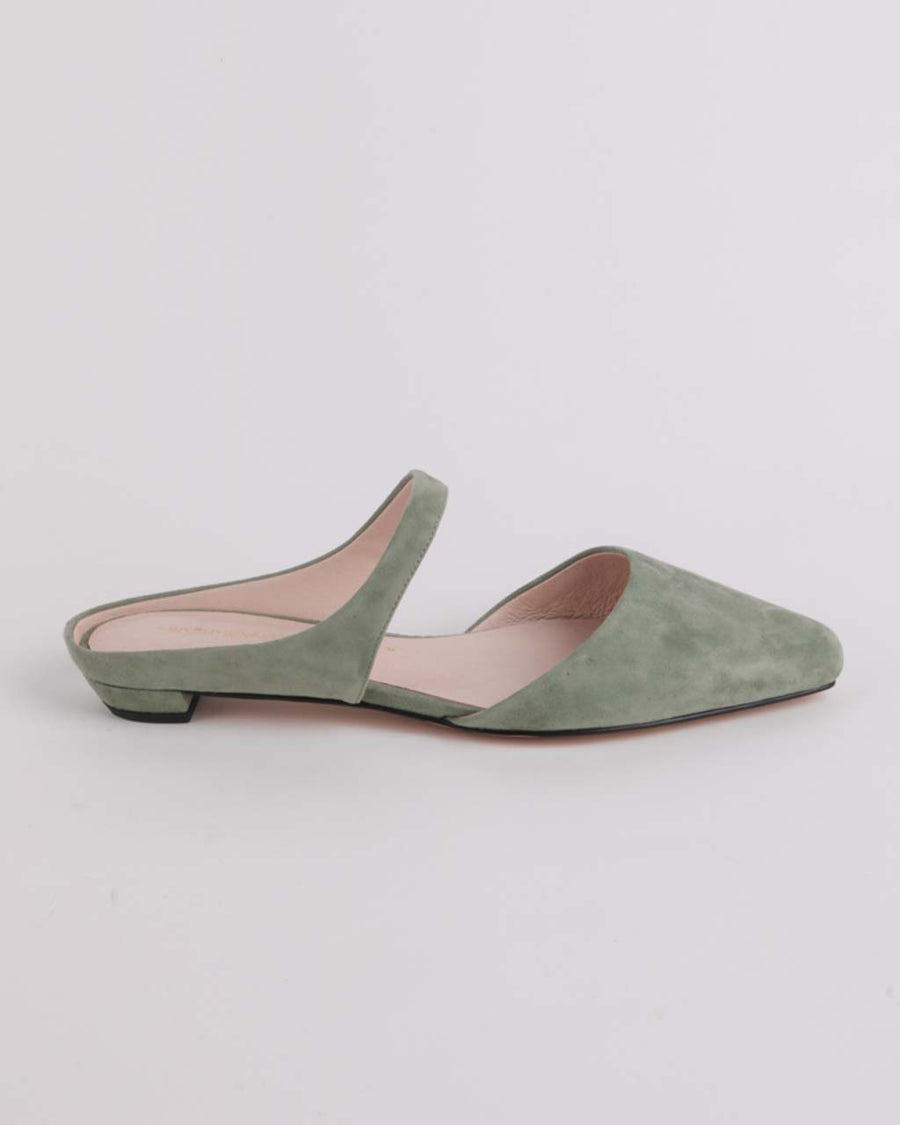 side view of sage suede kitten heel mule with strap and open back