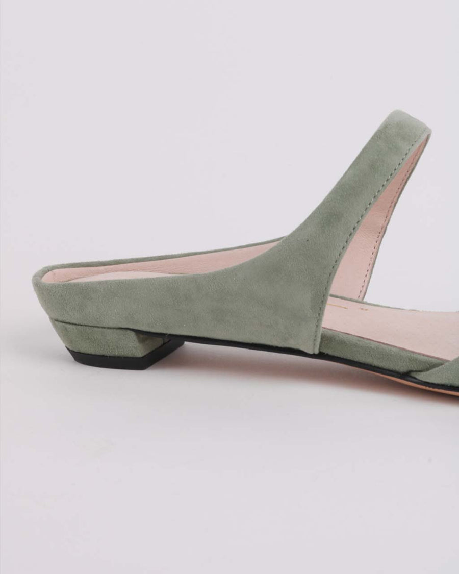 up close of heel on sage suede kitten heel mule with strap and open back