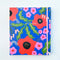 non-dated planner with blue ground and abstract 'wavy' daisy design