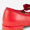 back view of cherry red mary jane shoes with bow strap