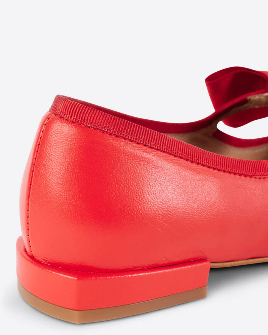 back view of cherry red mary jane shoes with bow strap