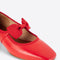 front of cherry red mary jane shoes with bow strap