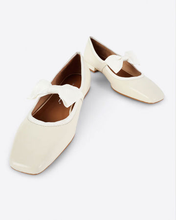 creme mary jane shoes with bow strap