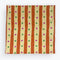 pale yellow and orange striped tea towel with green and pink dots