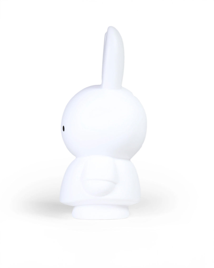 side view of large white miffy coin bank