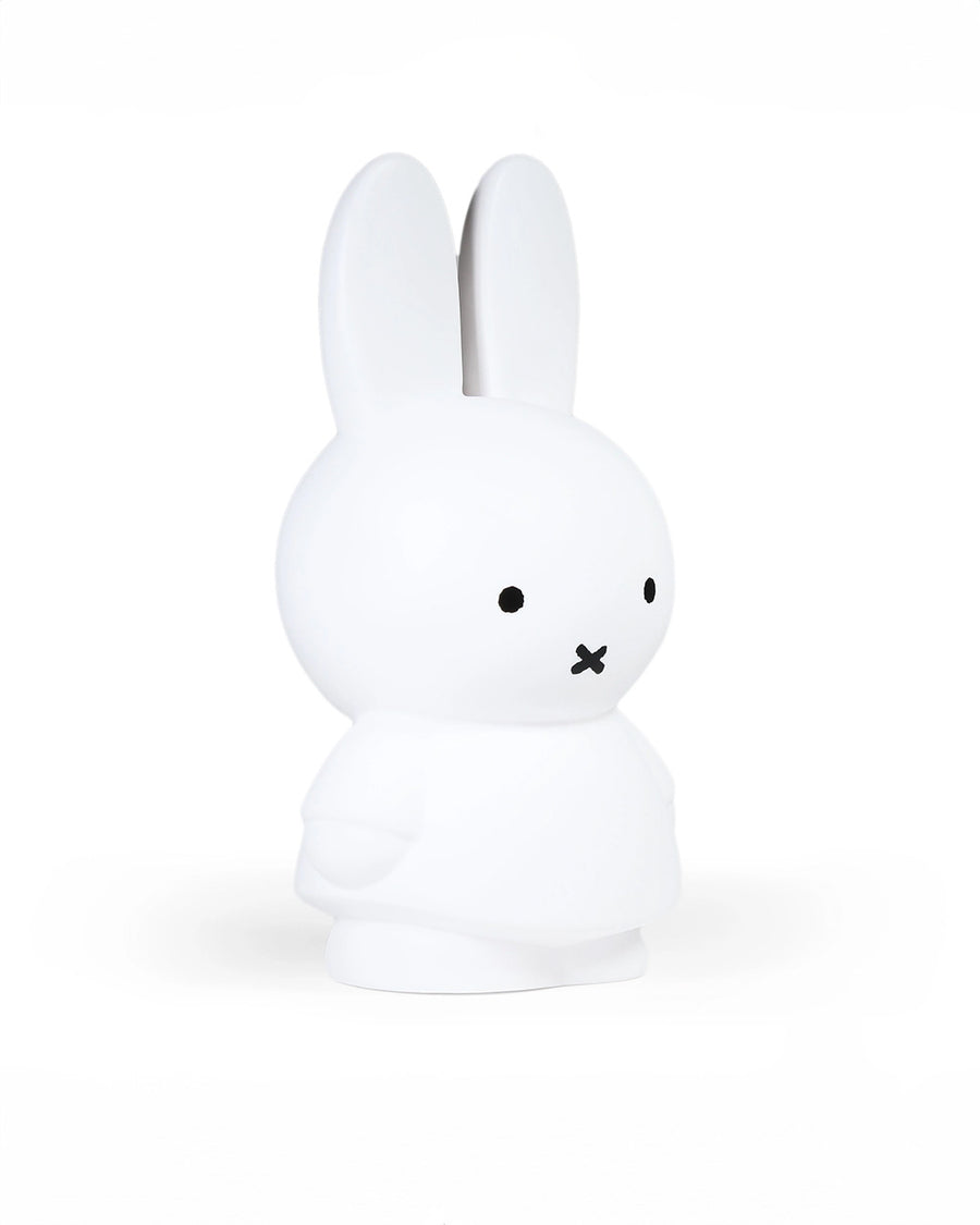 side view of large white miffy coin bank