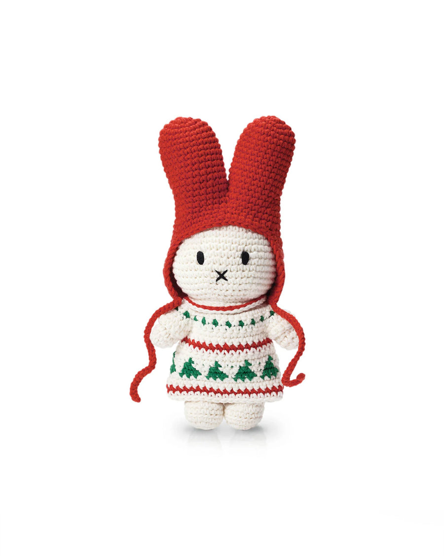 crochet miffy plush with red hat and white christmas dress with red stripes and tree design