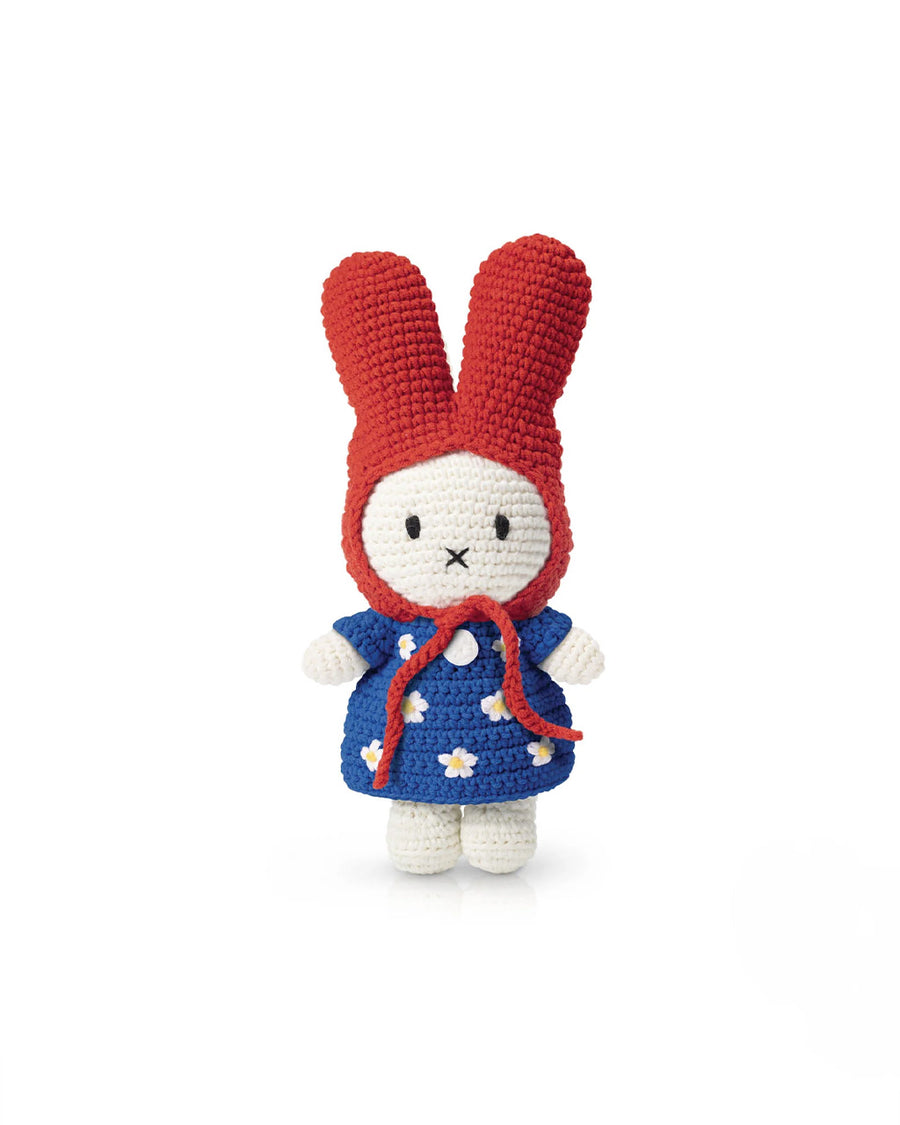 crochet miffy plush with red hat and blue dress with white flowers