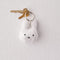 white muffy head plush keychain with keys on it