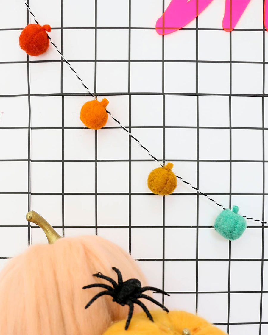 up close of rainbow felt pumpkins