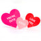 set of three acrylic conversation hearts: large hot pink 'you're cute, medium red 'i love you, and small light pink 'xoxo'