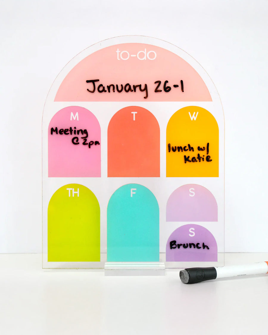colorful standing weekly to-do board with stand with things written on it