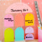 colorful standing weekly to-do board with stand on a desk