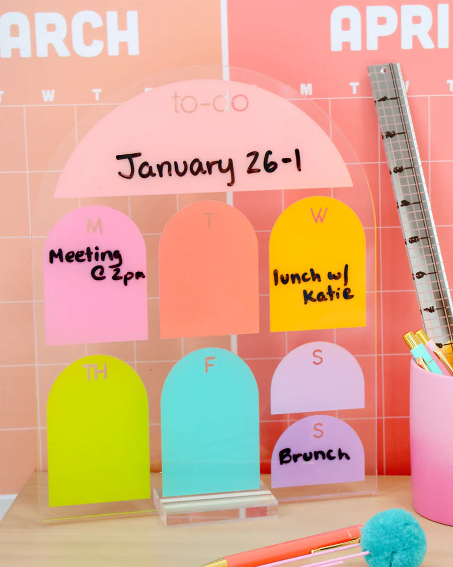 colorful standing weekly to-do board with stand on a desk