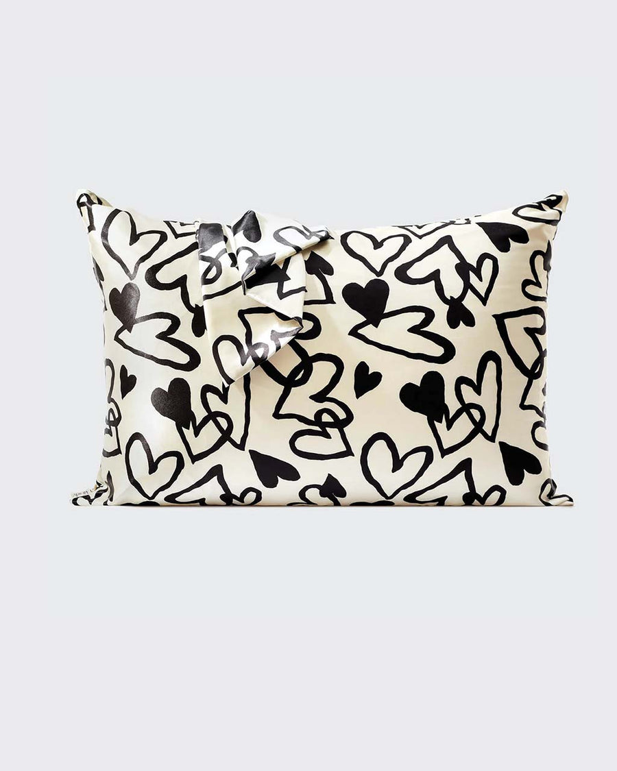 white satin pillowcase with black heart design