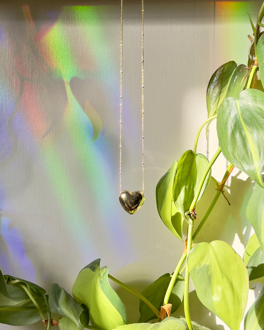 gold heart shaped pendant necklace