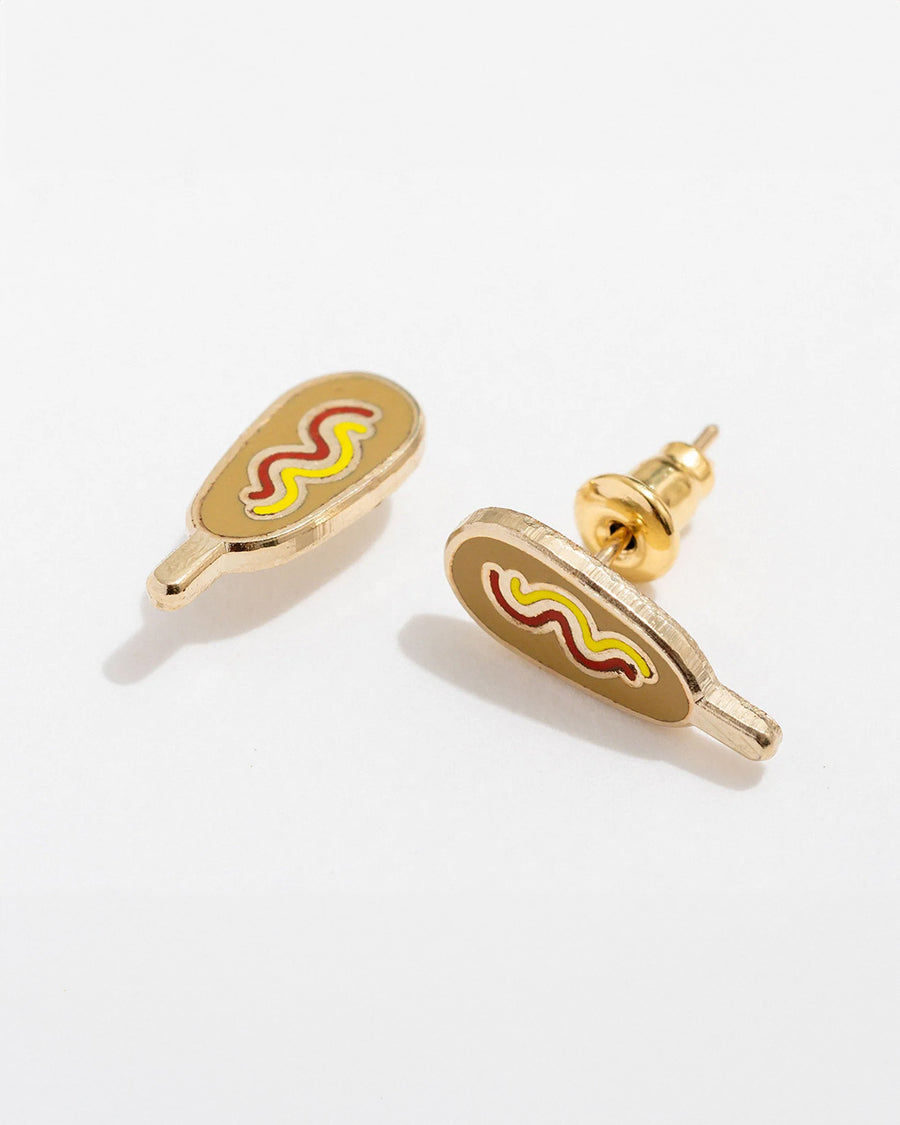 side view of pair of corn dog with ketchup and mustard enamel earrings