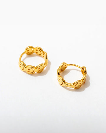 gold smiley hoop huggie earrings