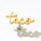 gold cursive 'taco' single stud earring