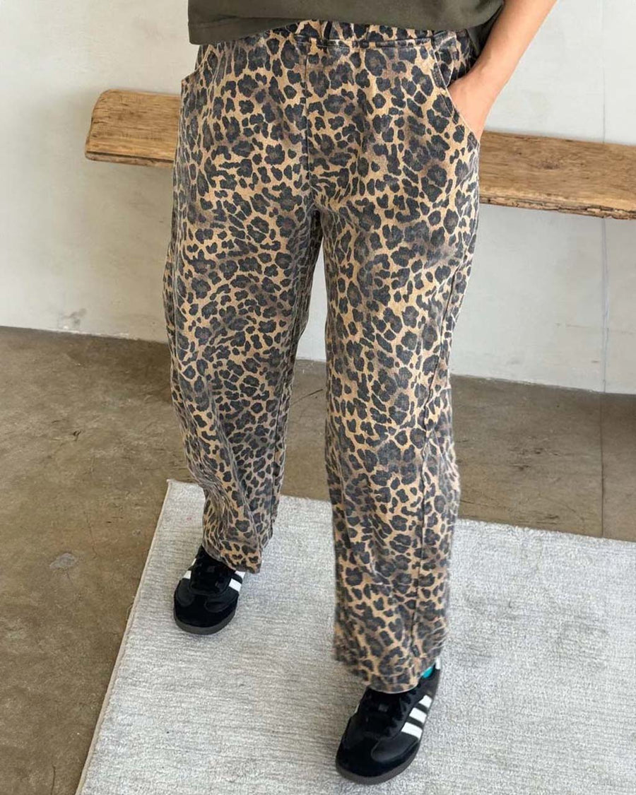 model wearing brown leopard print arc pants