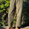 model wearing olive relaxed fit pants