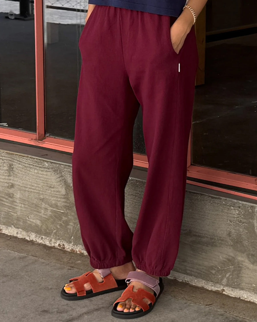 model wearing cabernet colored balloon pants