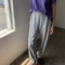 model wearing heather grey cotton balloon pants