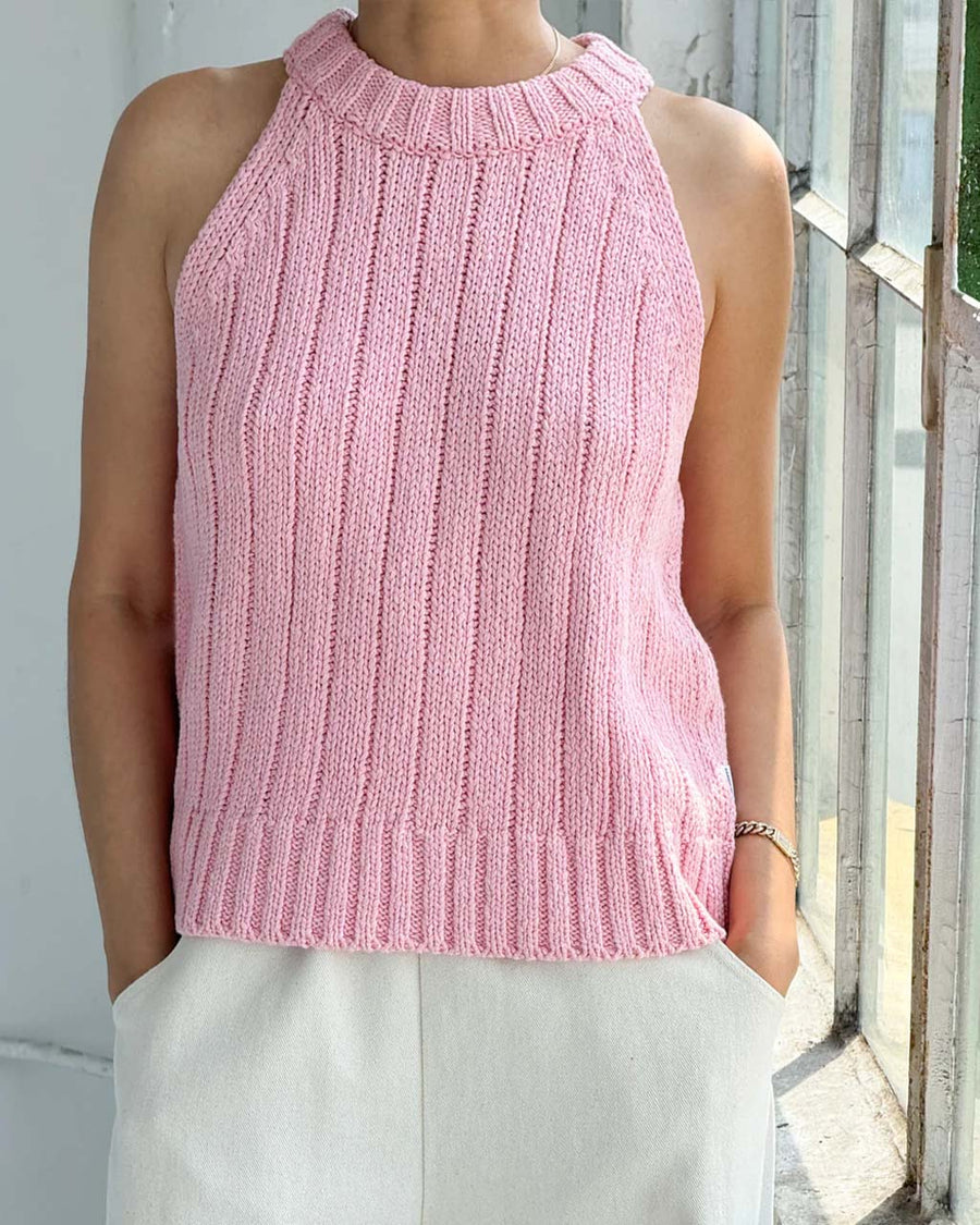 model wearing pink ribbed halter sweater tank