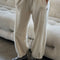 model wearing cream cotton terry balloon pants with pockets