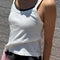 model wearing vintage white basic tank cami with black tank layered underneath