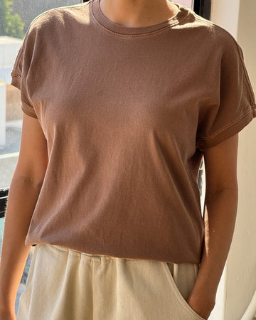 model wearing chocolate cotton t-shirt with banded sleeves