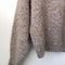 up close of taupe fuzzy sweater with relaxed fit and mock neck