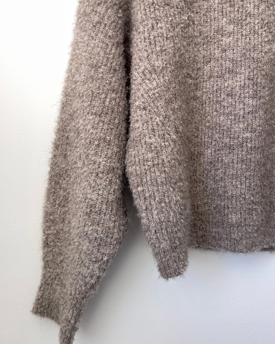 up close of taupe fuzzy sweater with relaxed fit and mock neck