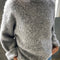 model wearing heather grey fuzzy sweater