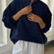 model wearing relaxed fit navy french terry quarter zip sweatshirt