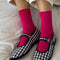 model wearing fuchsia pink ribbed crew socks