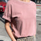 model wearing mauve relaxed fit cotton tee