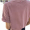 back view of model wearing mauve relaxed fit cotton tee