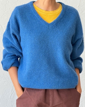 model wearing v-neck mohair sweater in royal blue 