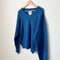 v-neck mohair sweater in royal blue on a hanger