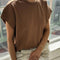 model wearing dark brown tee with slight cap sleeves and shorter length