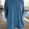 model wearing ocean cotton long sleeve tunic with deep side slits