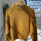 mustard yellow cotton sweater with thick banded bottom and mockneck 