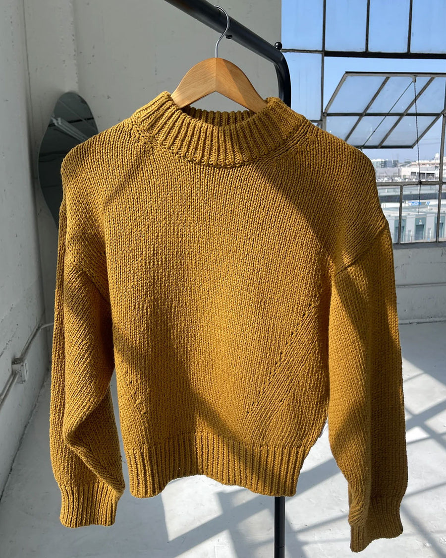 mustard yellow cotton sweater with thick banded bottom and mockneck 