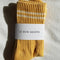 packaged butter ribbed socks with cream stripes