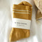 packaged butter ribbed socks with cream stripes