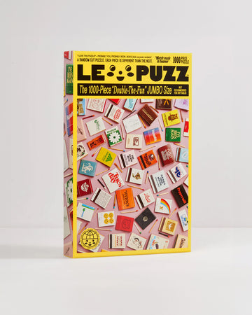 le puzz 1000 piece puzzle with pink ground and cute and colorful matchbooks