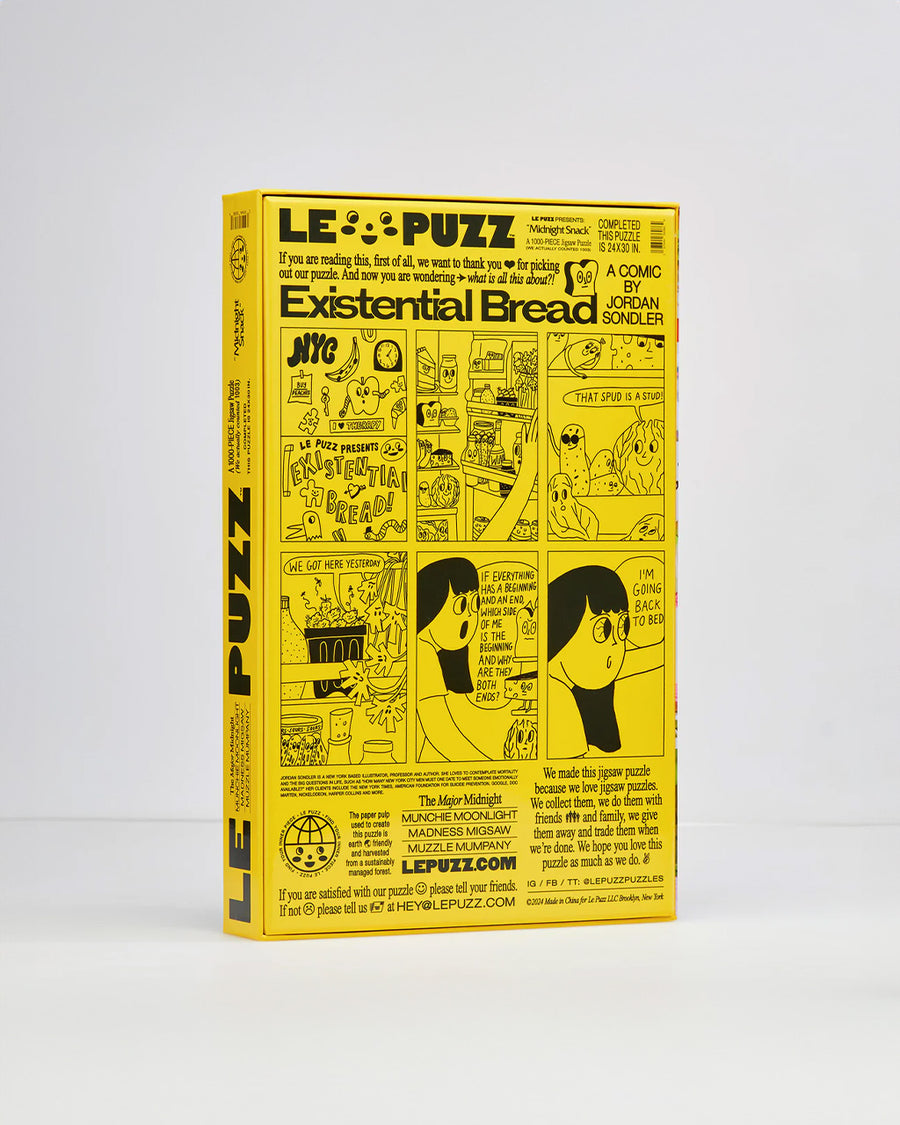 back view of le puzz 1000 piece puzzle with a fridge filled with very delicious food and snacks