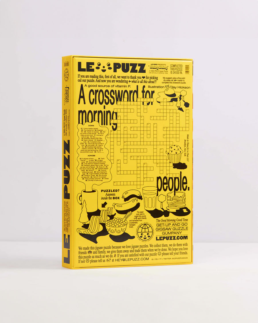 back view of boxed le puzz 1000 piece puzzle with various breakfast foods displayed