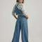 back view of model wearing low rise wide leg denim carpenter pants